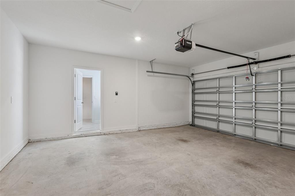 1723 Foreman Road Eagle Lake, FL 33839 - Photo 30 of 34 a view of a garage