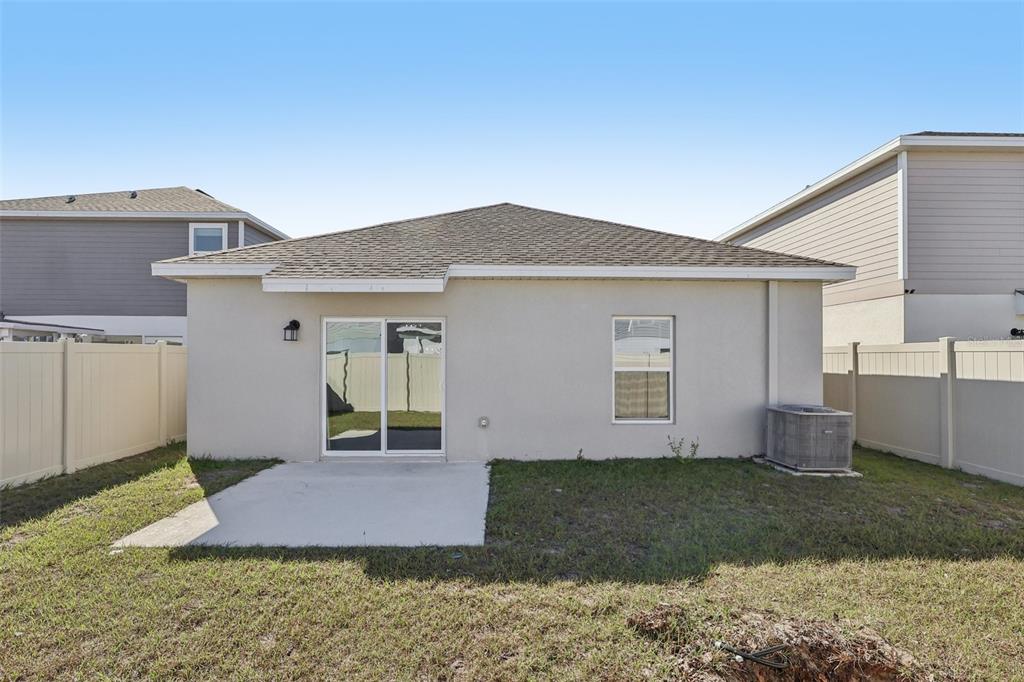 1723 Foreman Road Eagle Lake, FL 33839 - Photo 31 of 34 a front view of a house with a yard