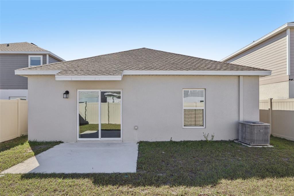 1723 Foreman Road Eagle Lake, FL 33839 - Photo 32 of 34 a view of a house with a yard