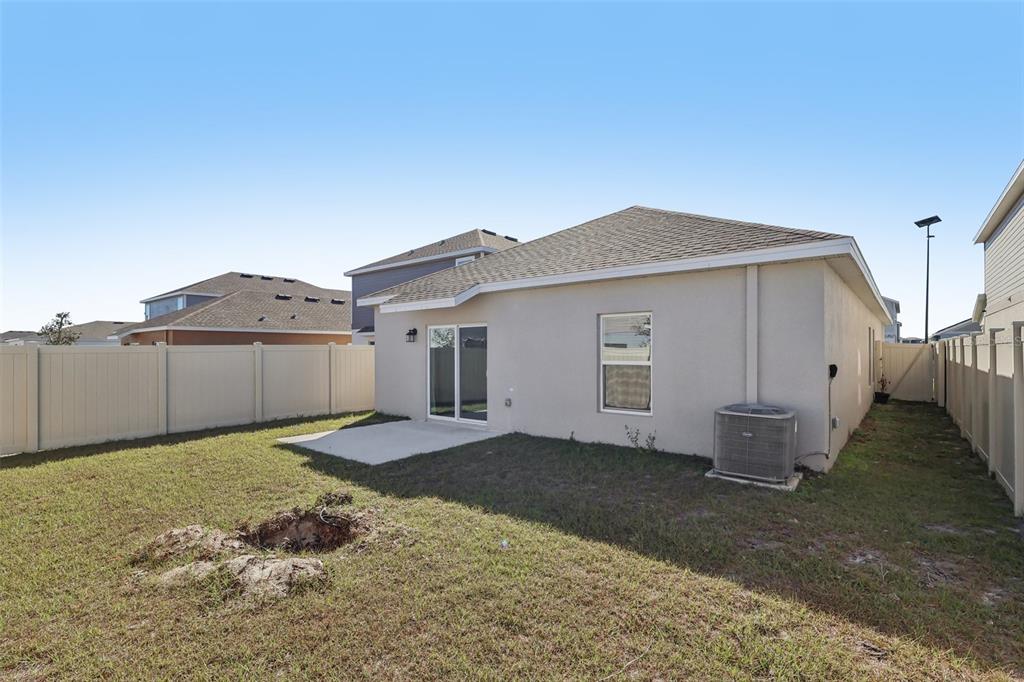 1723 Foreman Road Eagle Lake, FL 33839 - Photo 34 of 34 a backyard of a house