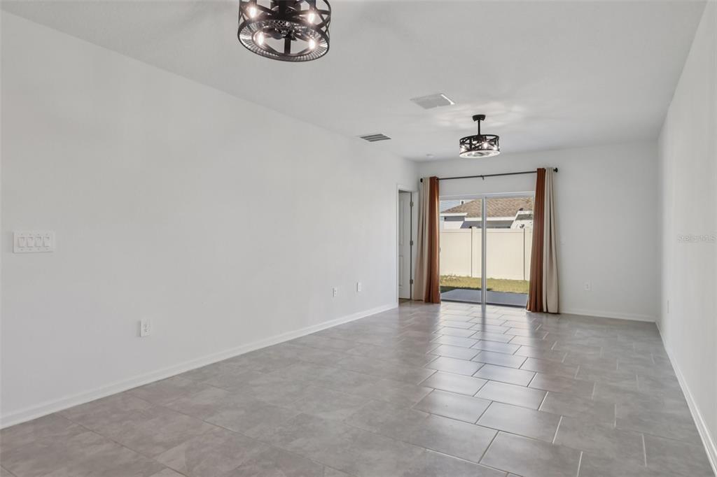 1723 Foreman Road Eagle Lake, FL 33839 - Photo 8 of 34 a view of an empty room and a window