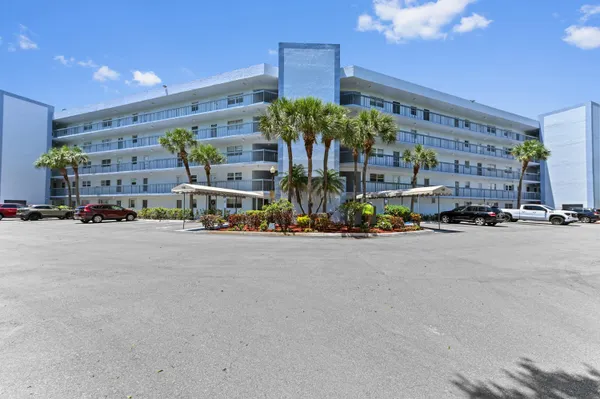 a front view of a building with street view