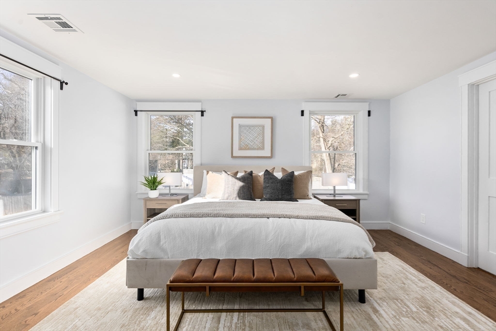 25 Geraldine Drive Wellesley, MA 02481 - Photo 14 of 24 a bedroom with a bed two lamps and a window