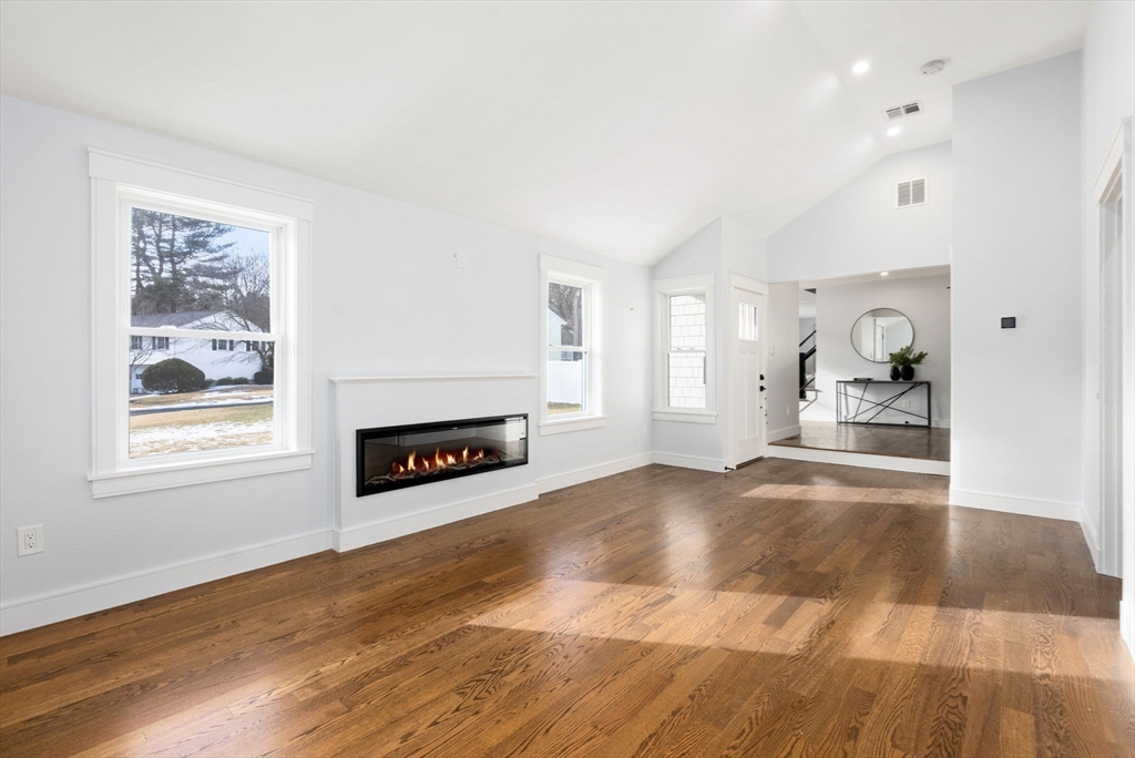 25 Geraldine Drive Wellesley, MA 02481 - Photo 9 of 24 a living room with furniture and a fireplace
