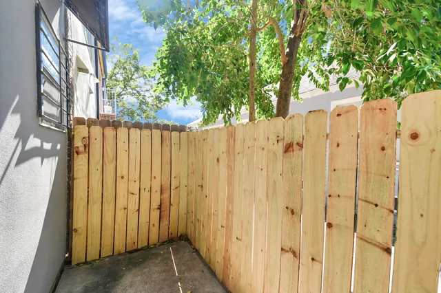 a view of a wooden fence