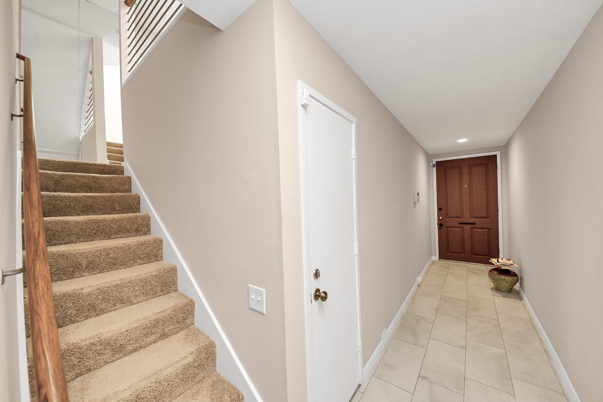 3540 Yupon Street Houston, TX 77006 - Photo 9 of 22 a view of an entryway with staircase