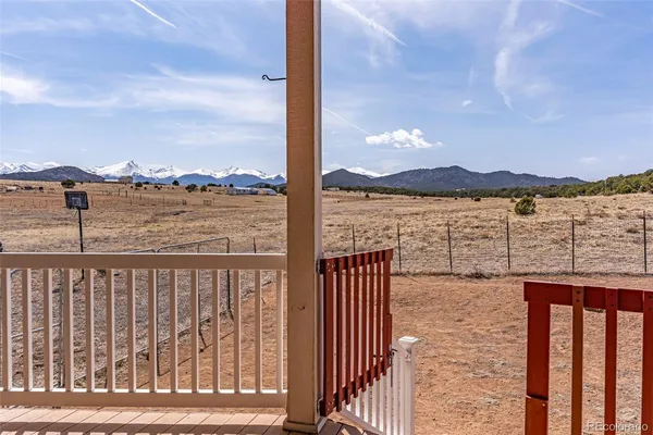 a view of a terrace with a lake view