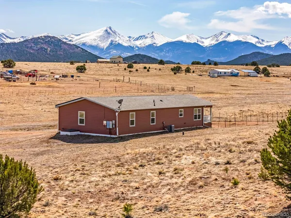 a view of a house with a mountain