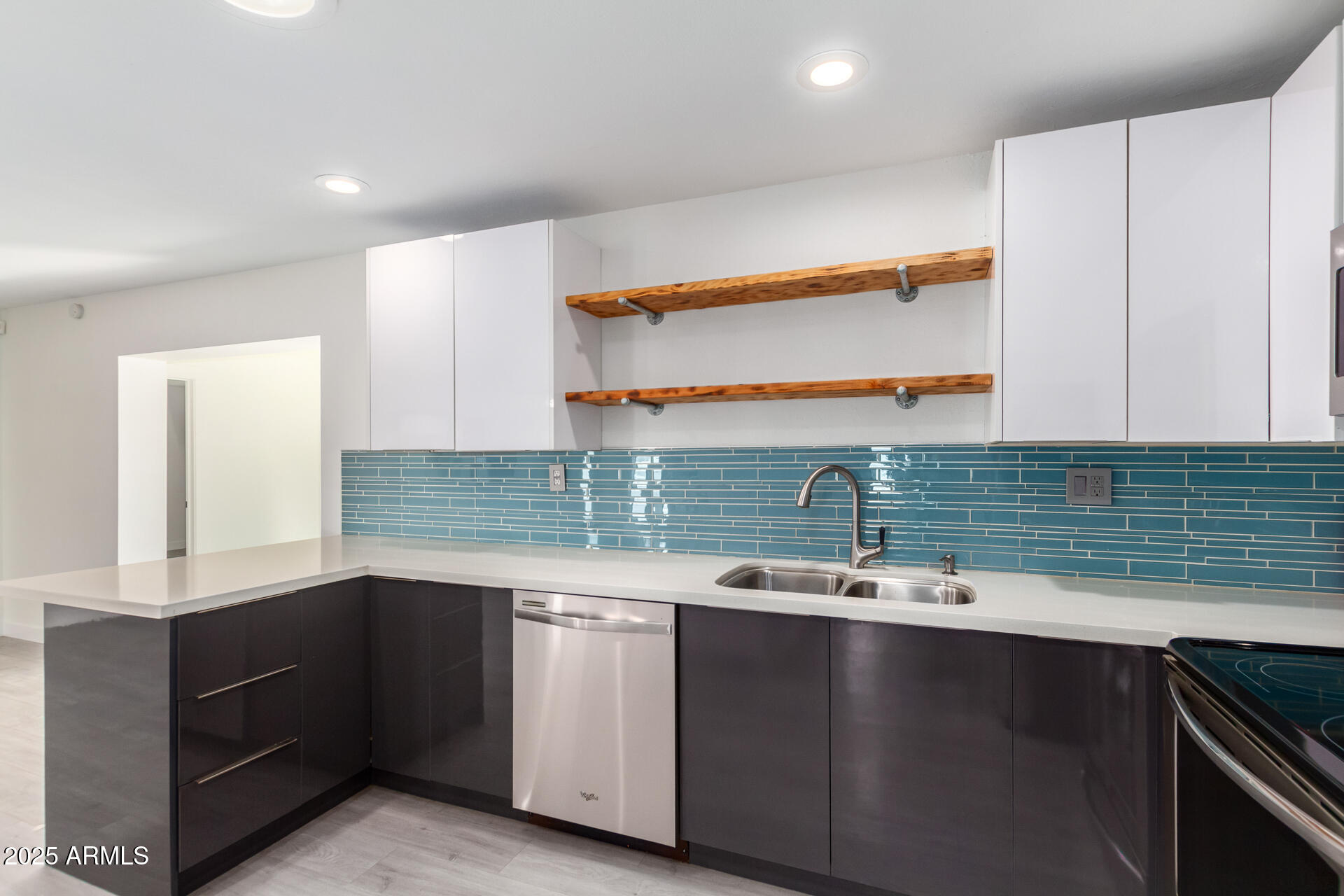 3329 East Palm Lane Phoenix, AZ 85008 - Photo 16 of 45 a kitchen with granite countertop a sink and a stove