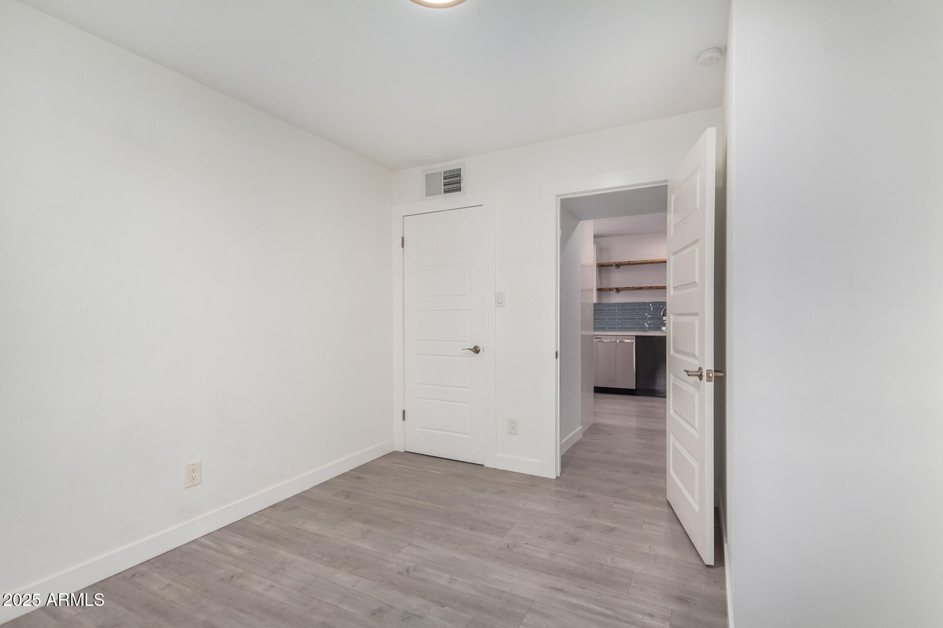 3329 East Palm Lane Phoenix, AZ 85008 - Photo 27 of 45 a view of a room with a hallway