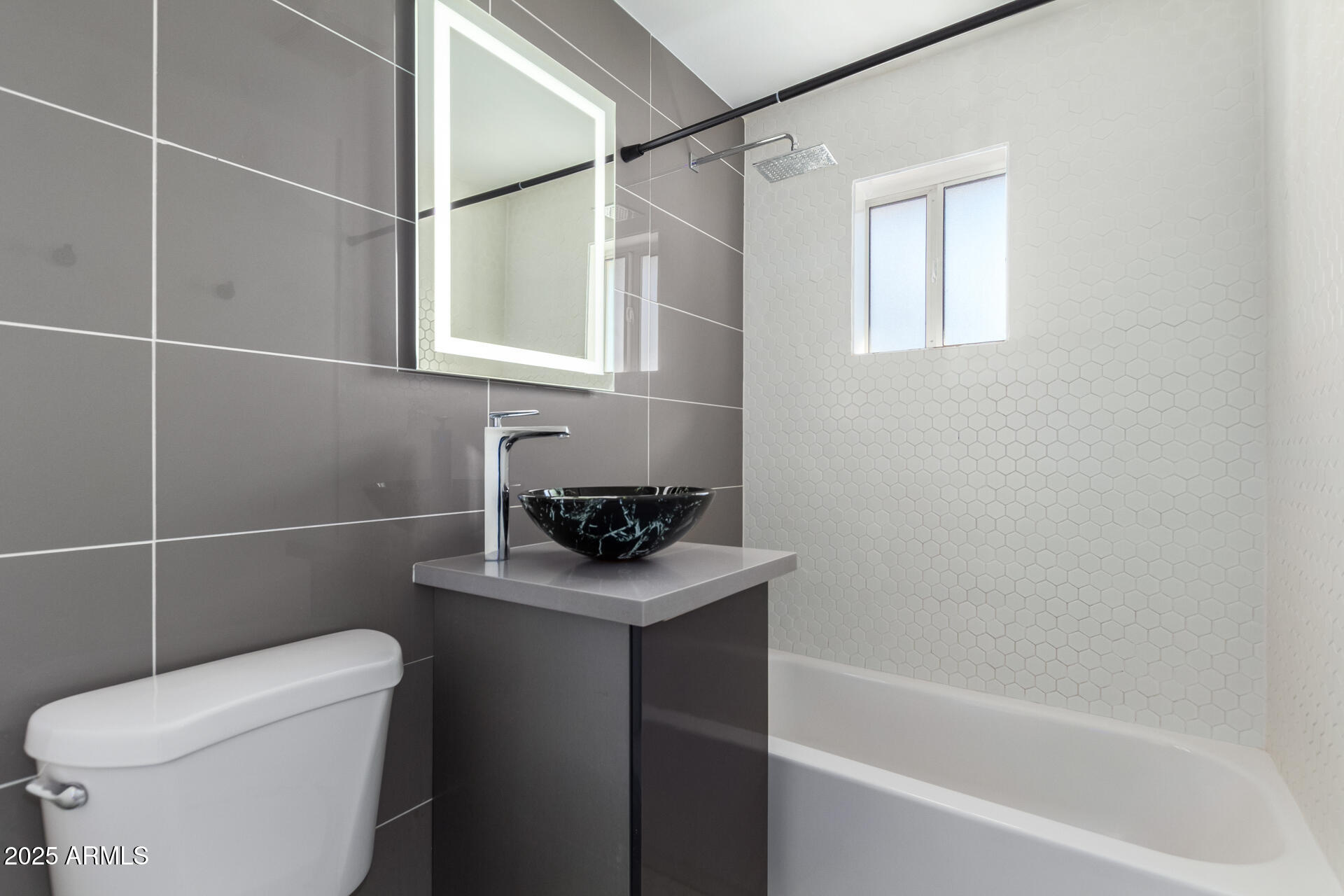 3329 East Palm Lane Phoenix, AZ 85008 - Photo 28 of 45 a bathroom with a sink toilet and shower