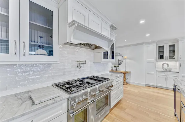 a bedroom with bed and a couch