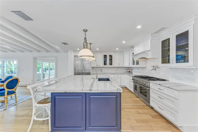 a spacious bathroom with a double vanity sink mirror and double