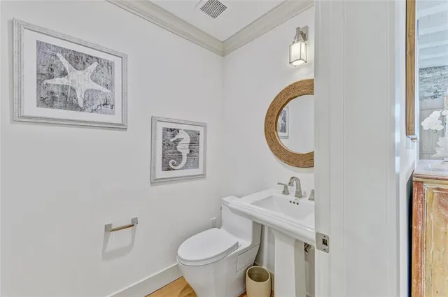 a living room with furniture a fireplace and a large window