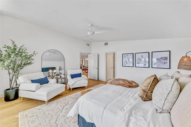 a view of a swimming pool with a lounge chair