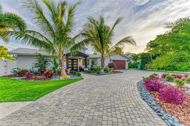 an aerial view of a house with a garden