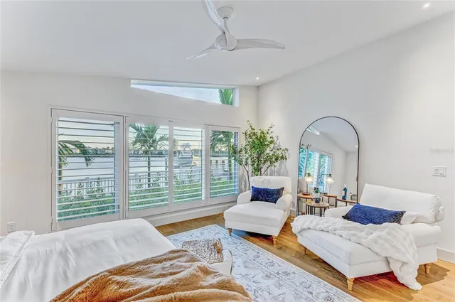 a view of swimming pool with a table and chairs