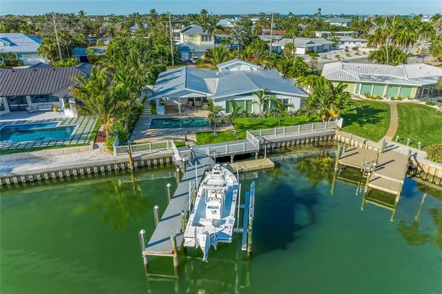 a kitchen with a stove and a wooden floors