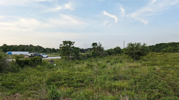a view of a yard and mountain view