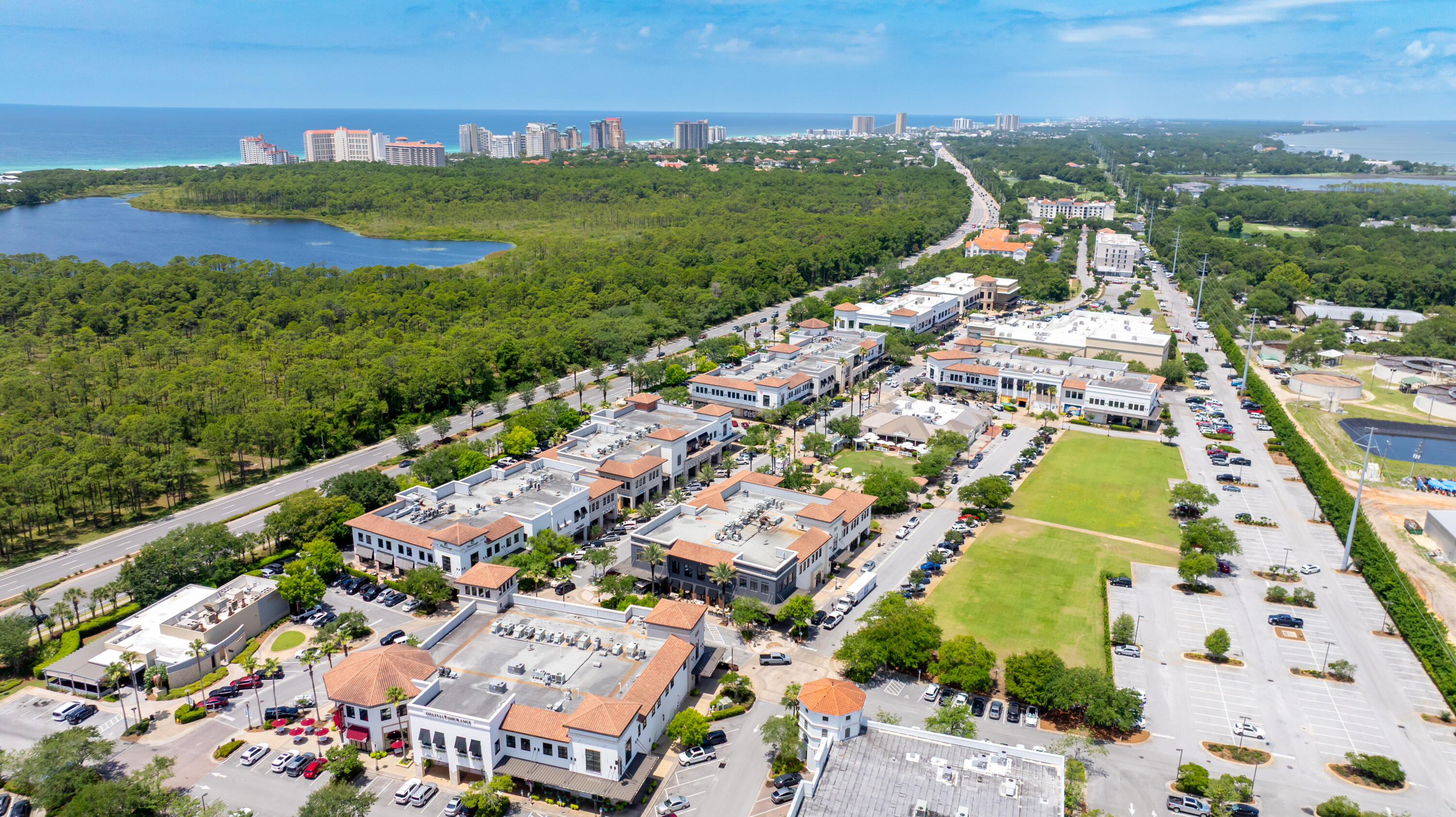 200 Sandestin Lane, Unit 1209 Miramar Beach, FL 32550 - Photo 28 of 30 an aerial view of a city with lots of residential buildings ocean and mountain view in back
