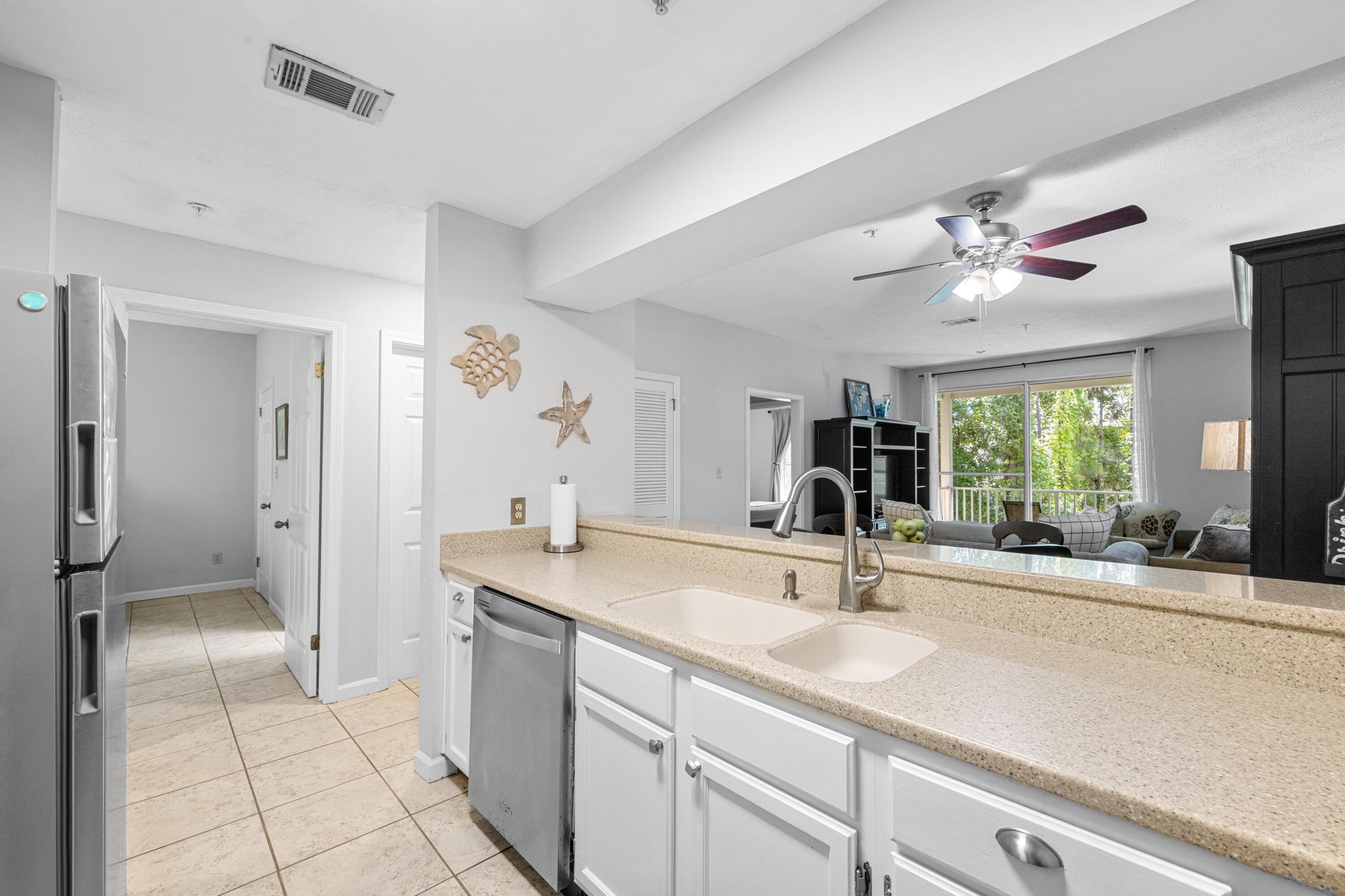 200 Sandestin Lane, Unit 1209 Miramar Beach, FL 32550 - Photo 5 of 30 a bathroom with a sink and a mirror