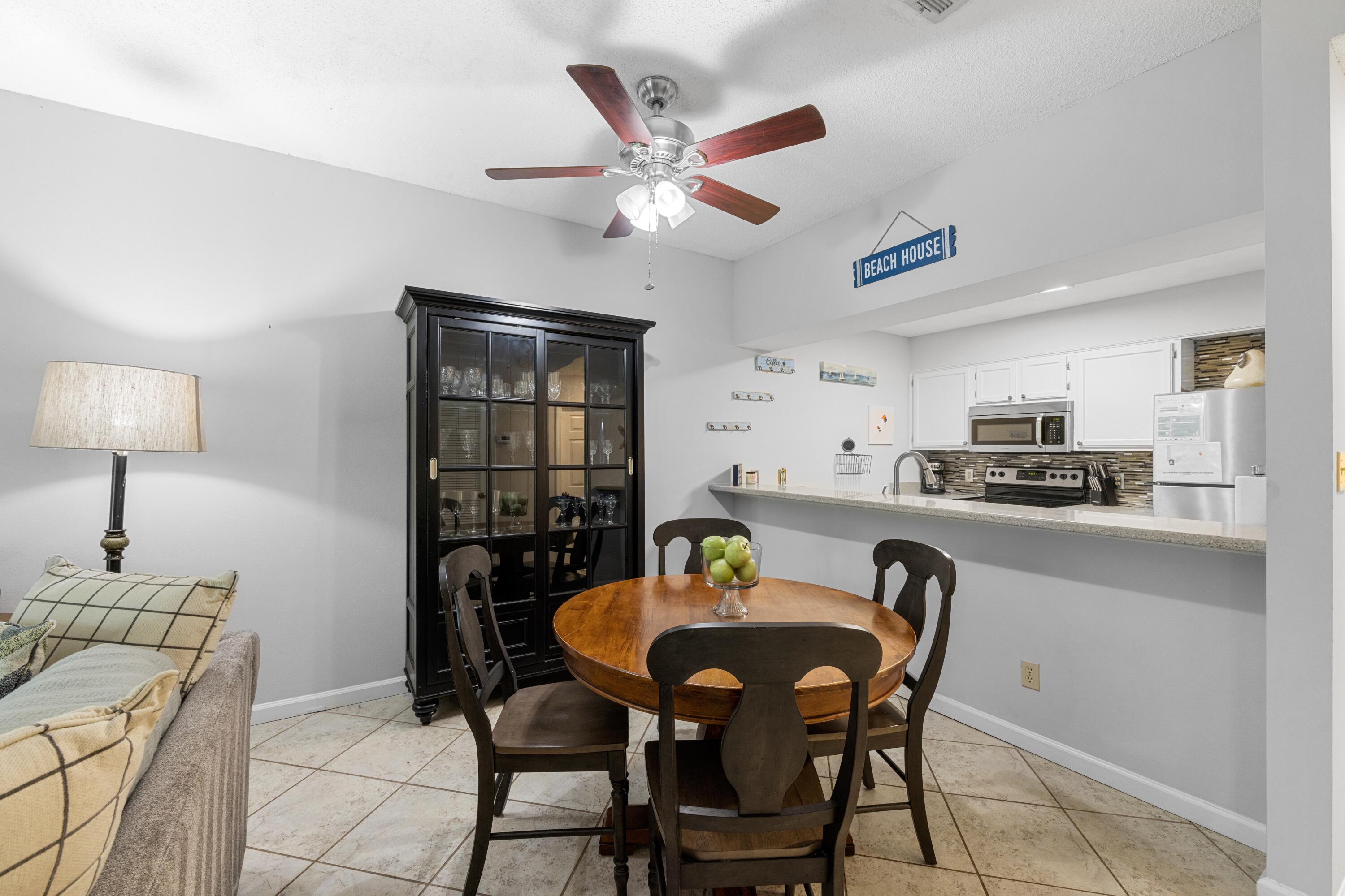 200 Sandestin Lane, Unit 1209 Miramar Beach, FL 32550 - Photo 7 of 30 a dining room with furniture and window