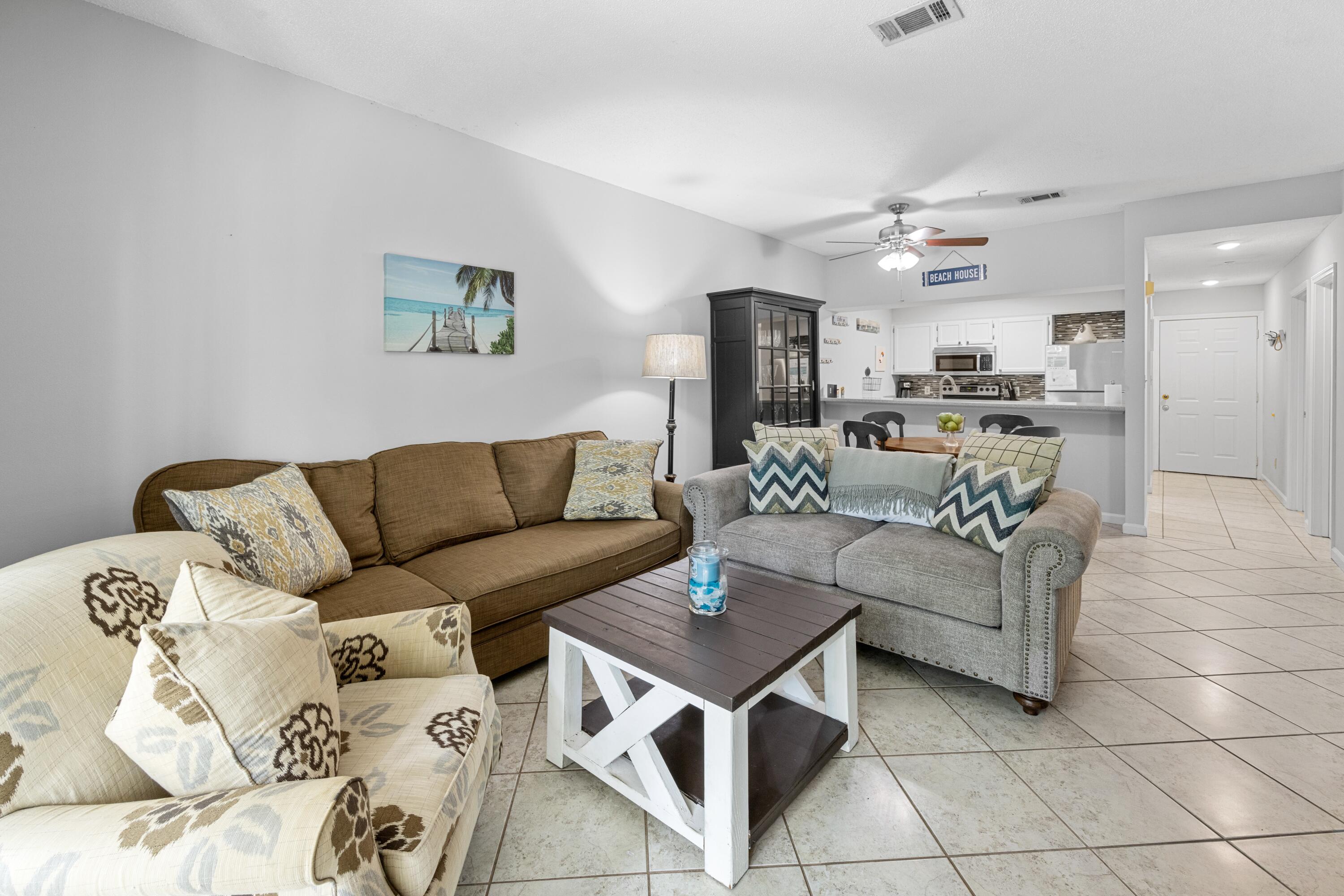 200 Sandestin Lane, Unit 1209 Miramar Beach, FL 32550 - Photo 10 of 30 a living room with furniture and a view of kitchen