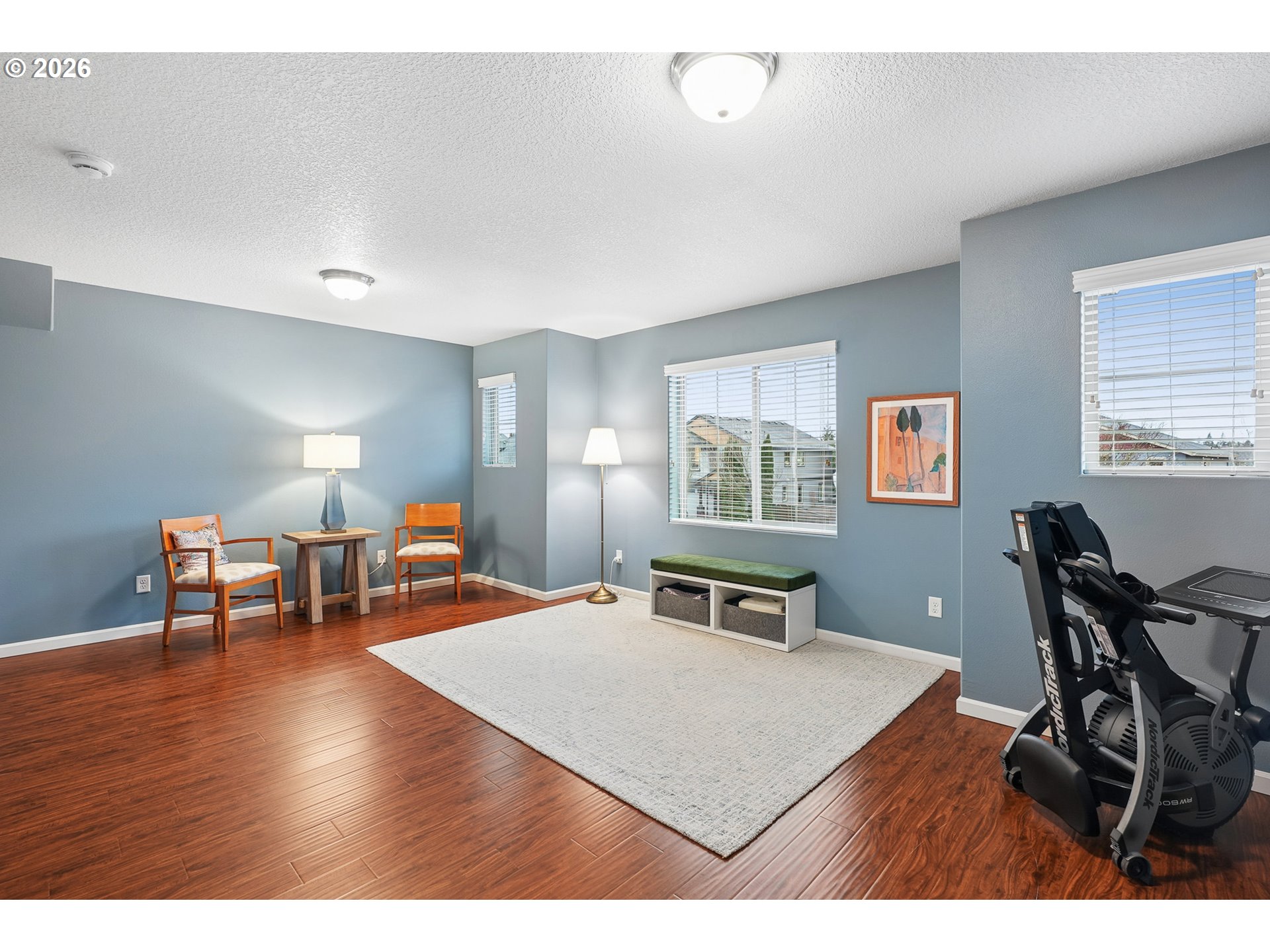 504 North Allen Creek Drive Ridgefield, WA 98642 - Photo 27 of 38 a living room with furniture and a table