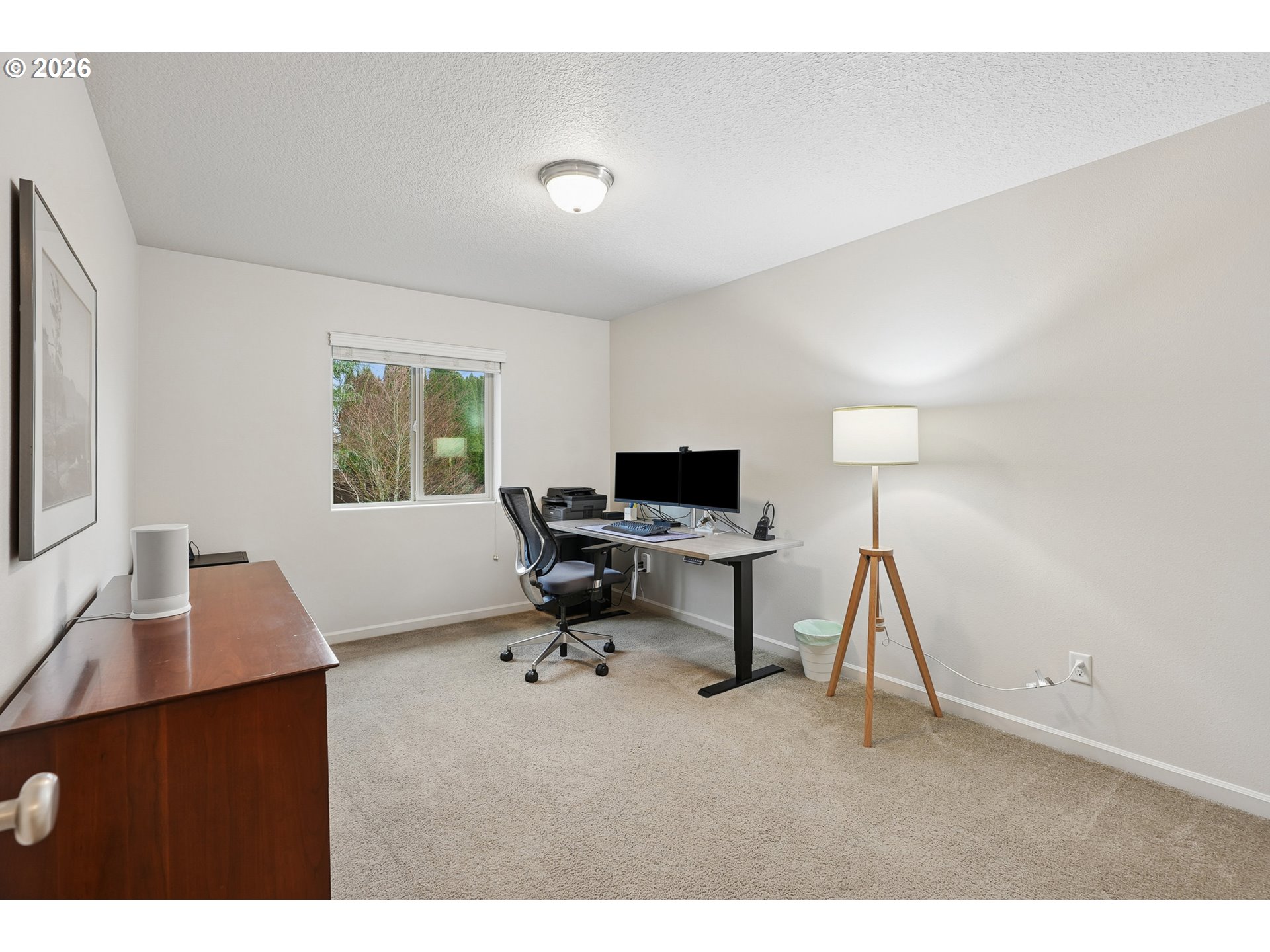 504 North Allen Creek Drive Ridgefield, WA 98642 - Photo 32 of 38 a living room with furniture and a flat screen tv