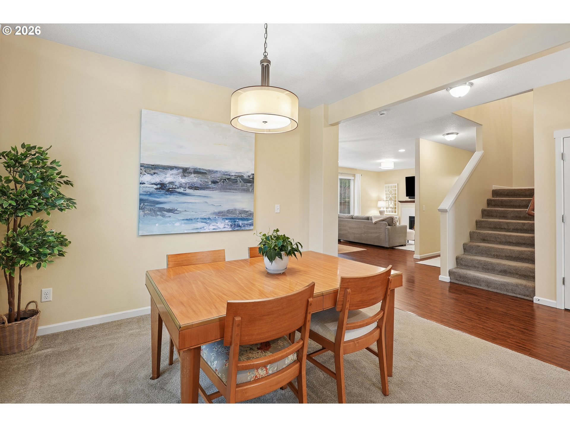 504 North Allen Creek Drive Ridgefield, WA 98642 - Photo 10 of 38 a view of a dining room with furniture and wooden floor