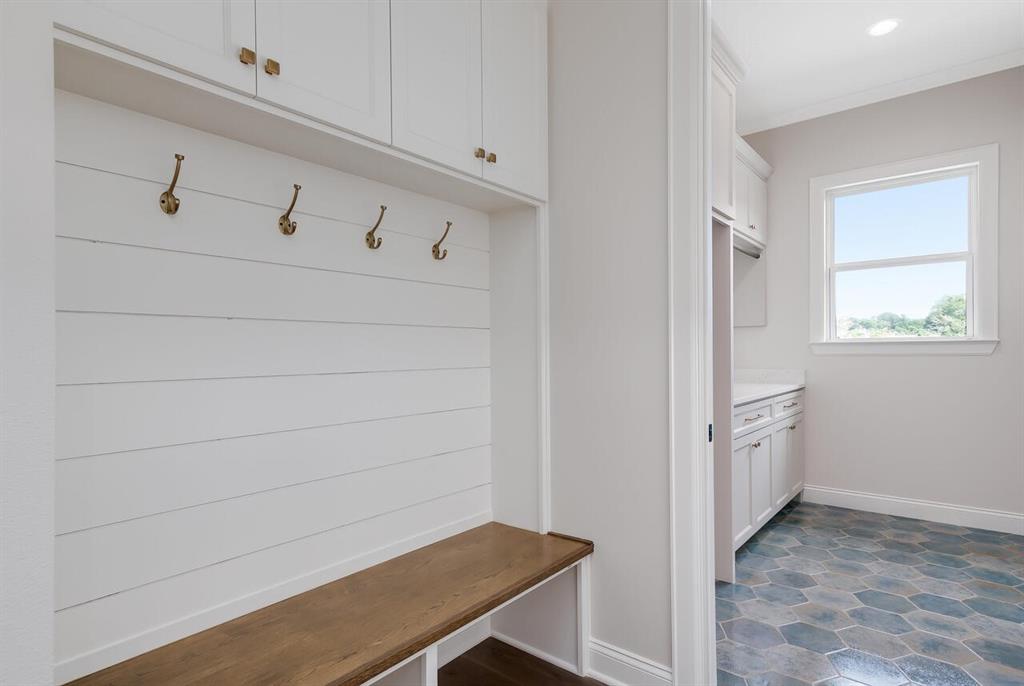 8005 Bee Cave Road China Spring, TX 76633 - Photo 22 of 40 Mudroom with baseboards and ornamental molding