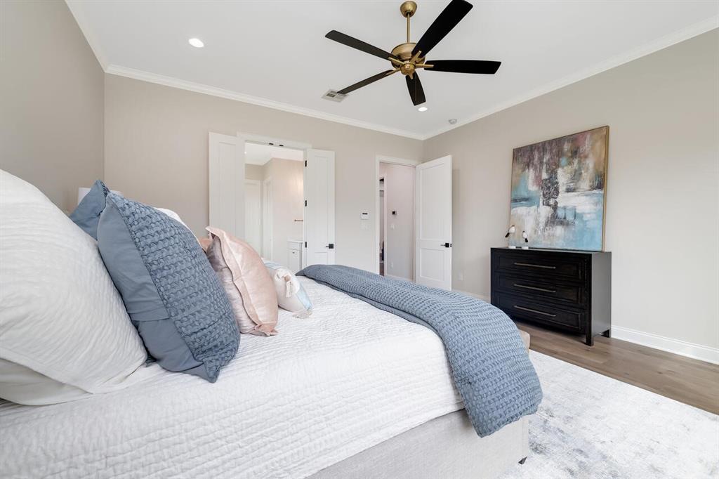 8005 Bee Cave Road China Spring, TX 76633 - Photo 25 of 40 Bedroom with wood finished floors, recessed lighting, ornamental molding, and ceiling fan