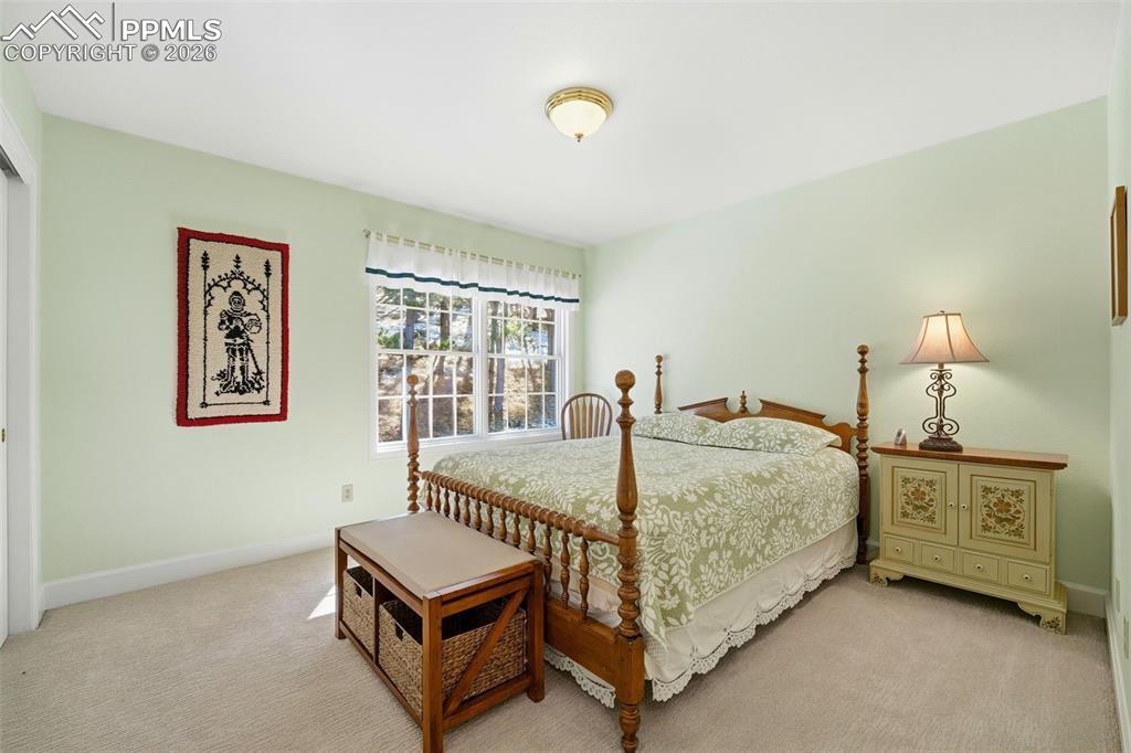 8795 Moss Rock Road Colorado Springs, CO 80908 - Photo 21 of 47 Second Bedroom Upstairs