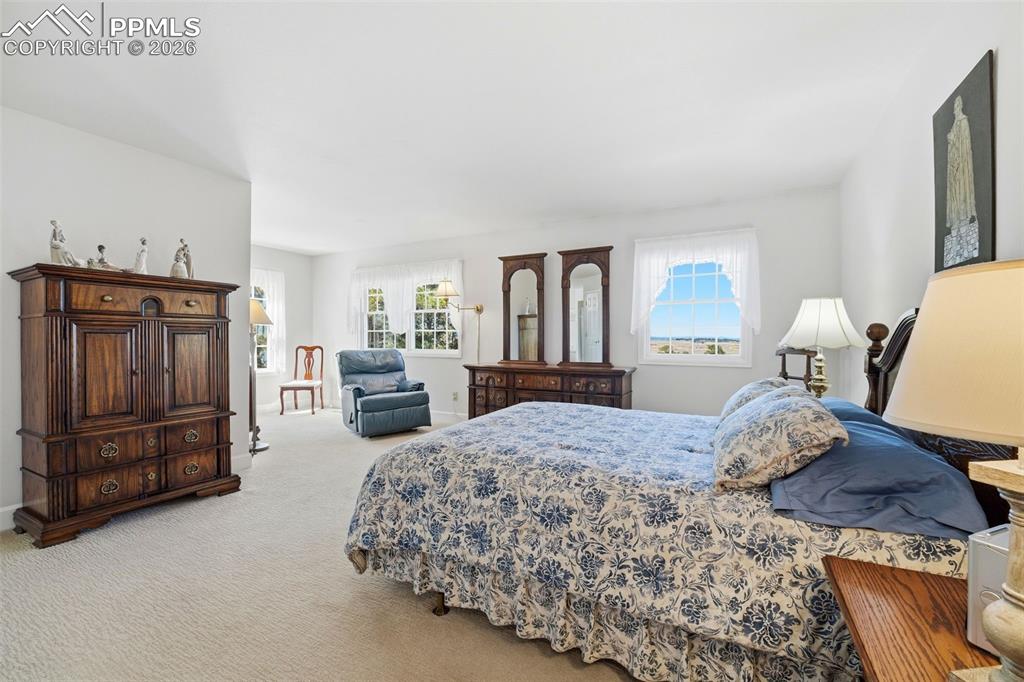 8795 Moss Rock Road Colorado Springs, CO 80908 - Photo 23 of 47 Large Primary Suite with Sitting Area