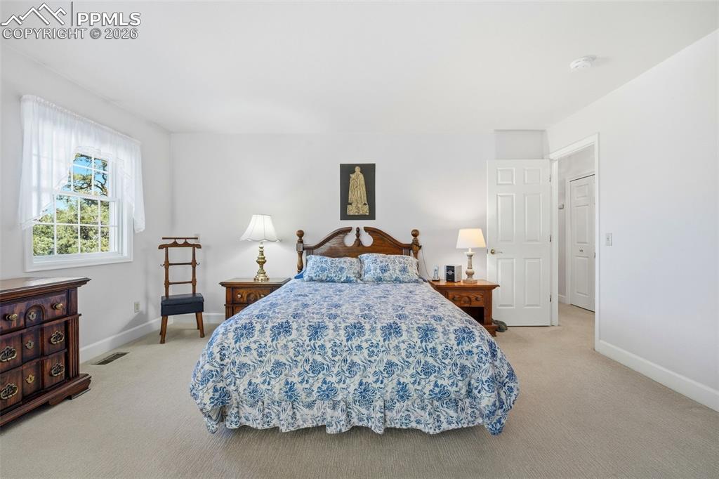 8795 Moss Rock Road Colorado Springs, CO 80908 - Photo 24 of 47 Primary Suite fits a King-Size Bed