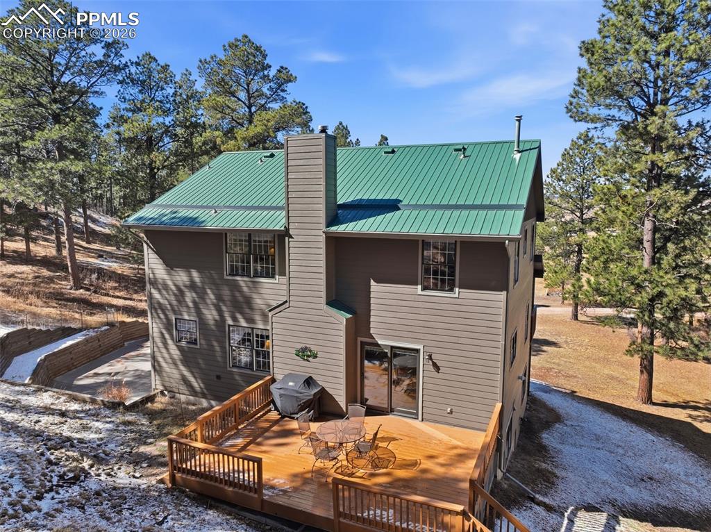 8795 Moss Rock Road Colorado Springs, CO 80908 - Photo 39 of 47 Back Deck is perfect spot for soaking up the Colorado Sun!