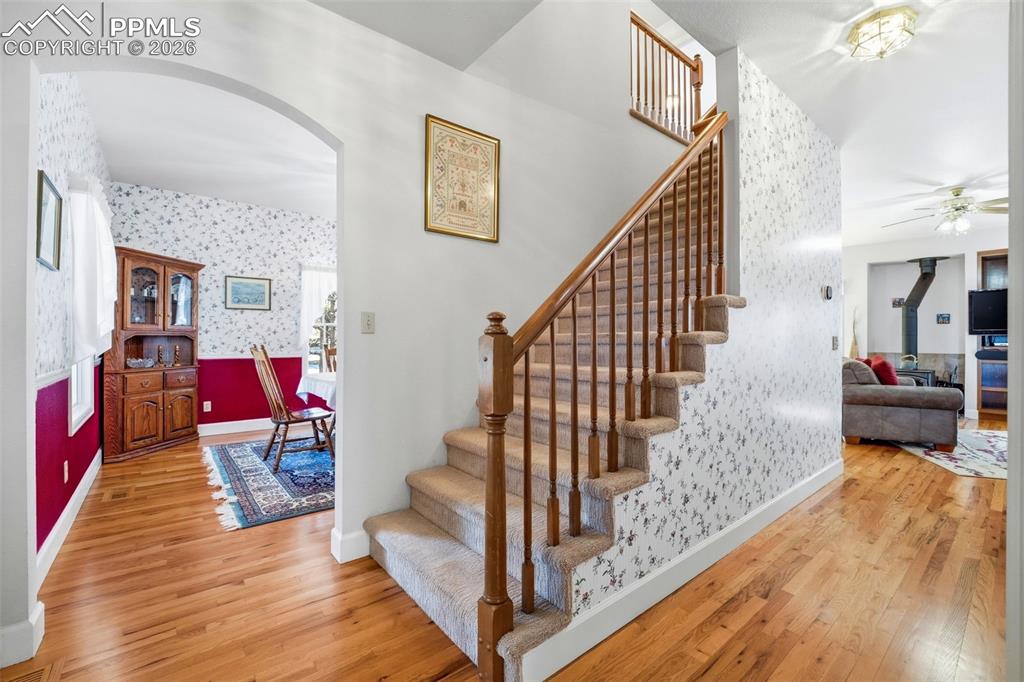 8795 Moss Rock Road Colorado Springs, CO 80908 - Photo 7 of 47 Entry with Grand Staircase