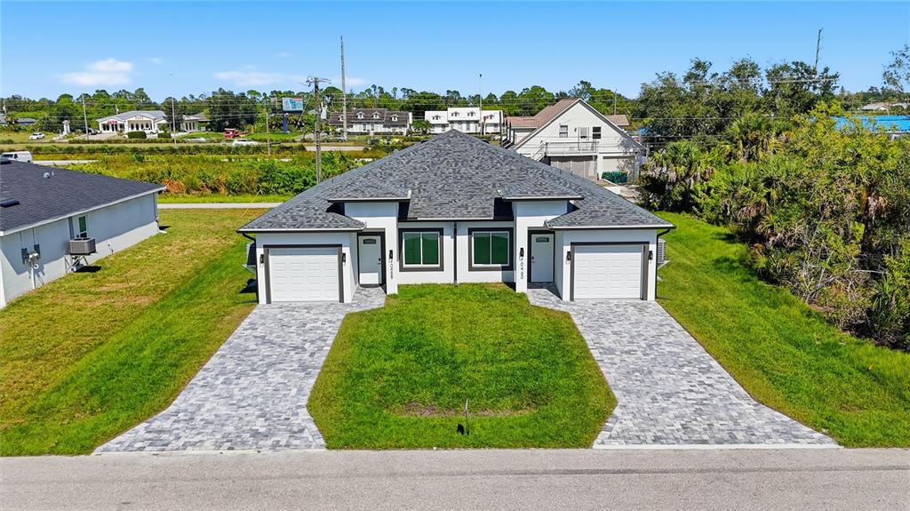 front view of a house with a yard