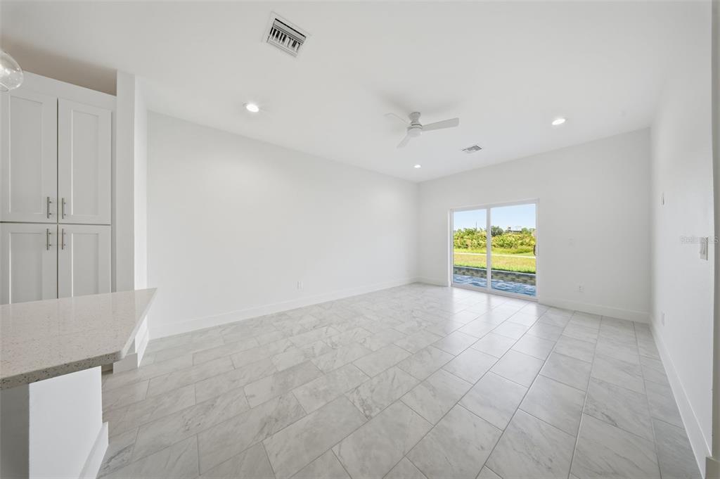 10458 Pendleton Avenue Englewood, FL 34224 - Photo 11 of 30 a view of an empty room with a window