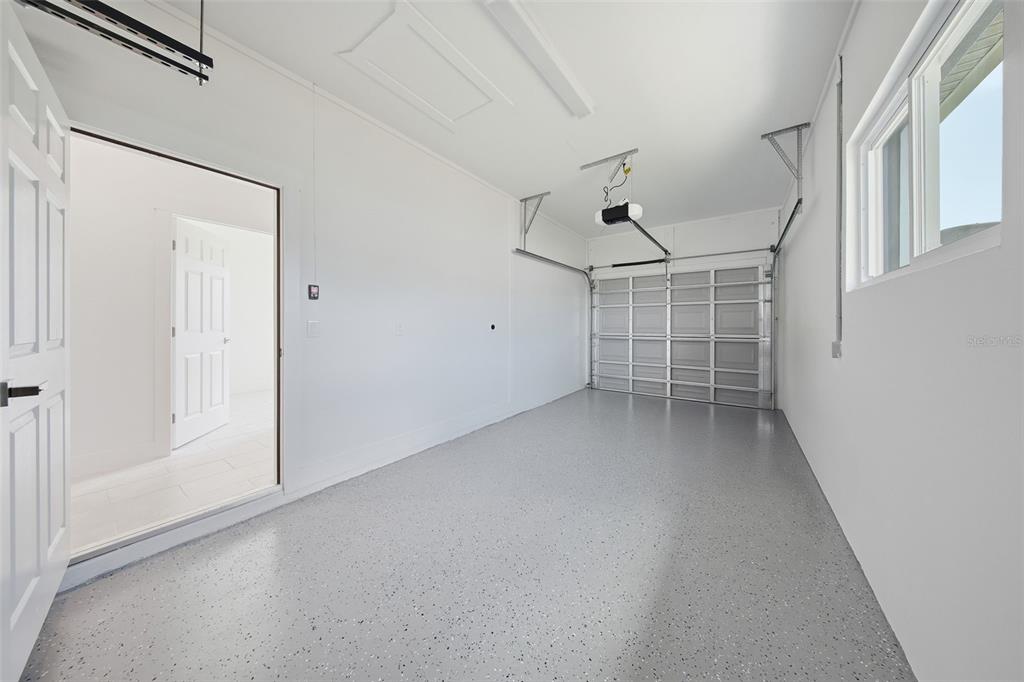 10458 Pendleton Avenue Englewood, FL 34224 - Photo 15 of 30 a view of a garage