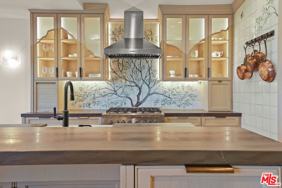 2835 Oak Point Drive Los Angeles, CA 90068 - Photo 12 of 50 a view of a sink and mirror with large window