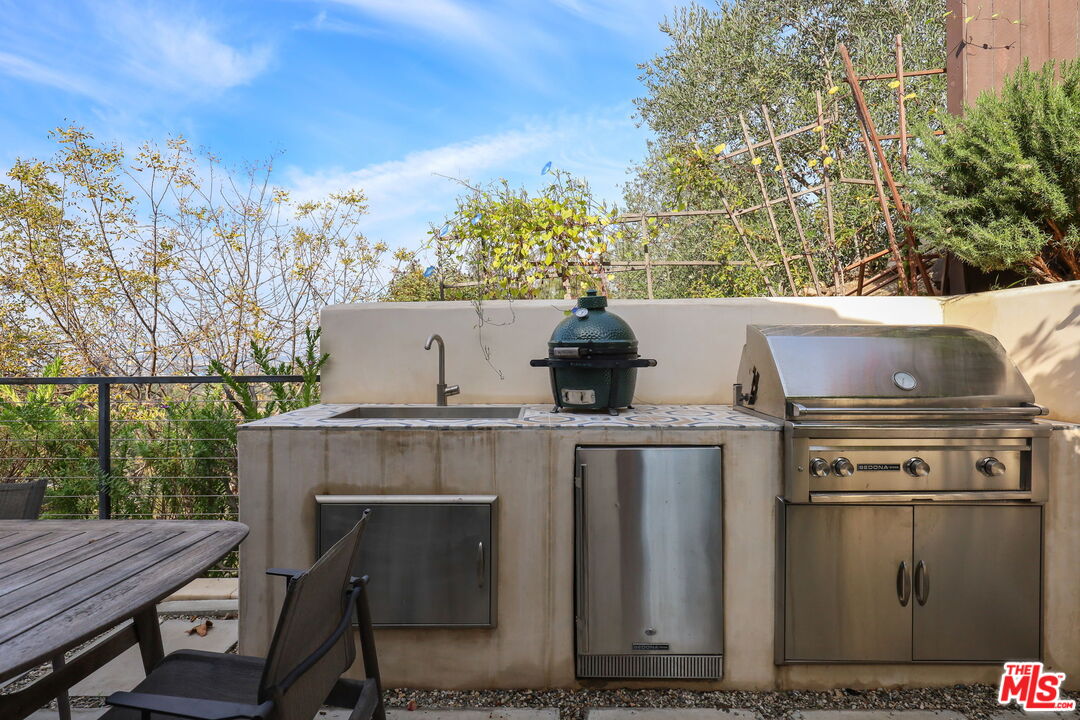 2835 Oak Point Drive Los Angeles, CA 90068 - Photo 33 of 50 a view of a chairs and table on the deck