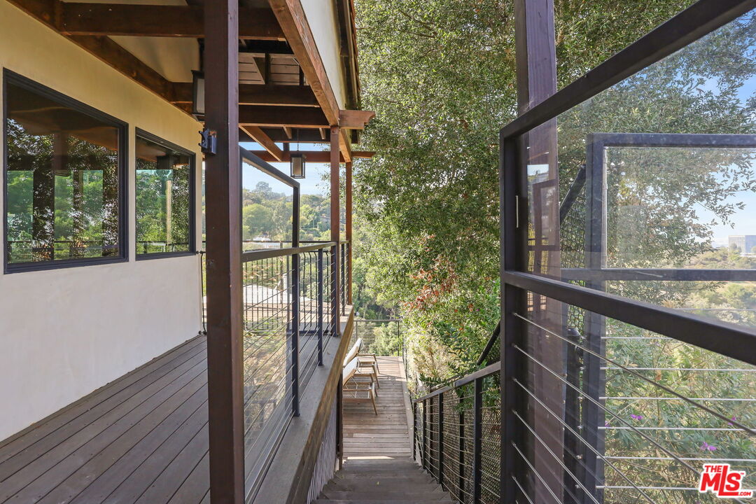 2835 Oak Point Drive Los Angeles, CA 90068 - Photo 35 of 50 a view of balcony with wooden floor