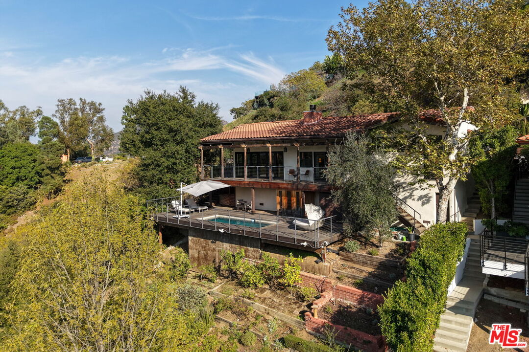 2835 Oak Point Drive Los Angeles, CA 90068 - Photo 42 of 50 a front view of a house with garden
