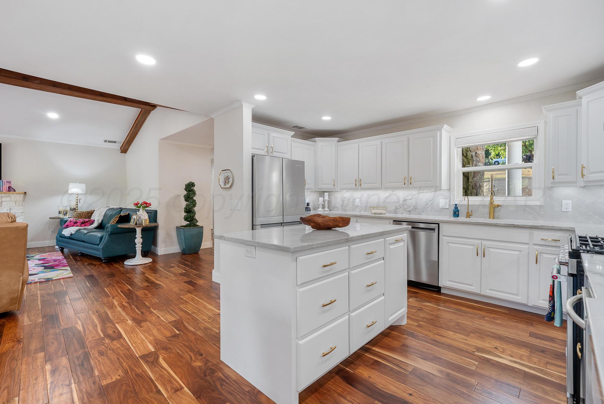 110 Caprock Lane Amarillo, TX 79118 - Photo 13 of 46 a kitchen with counter top space and cabinets