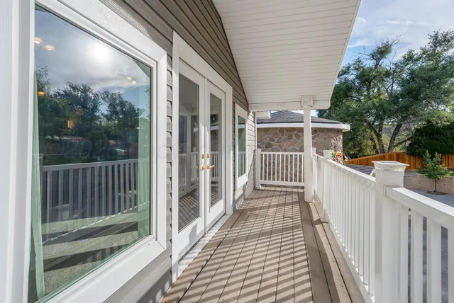 a porch with wooden floor