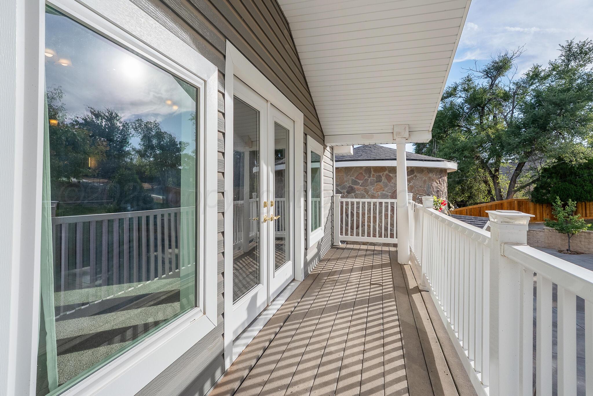 110 Caprock Lane Amarillo, TX 79118 - Photo 26 of 46 a porch with wooden floor