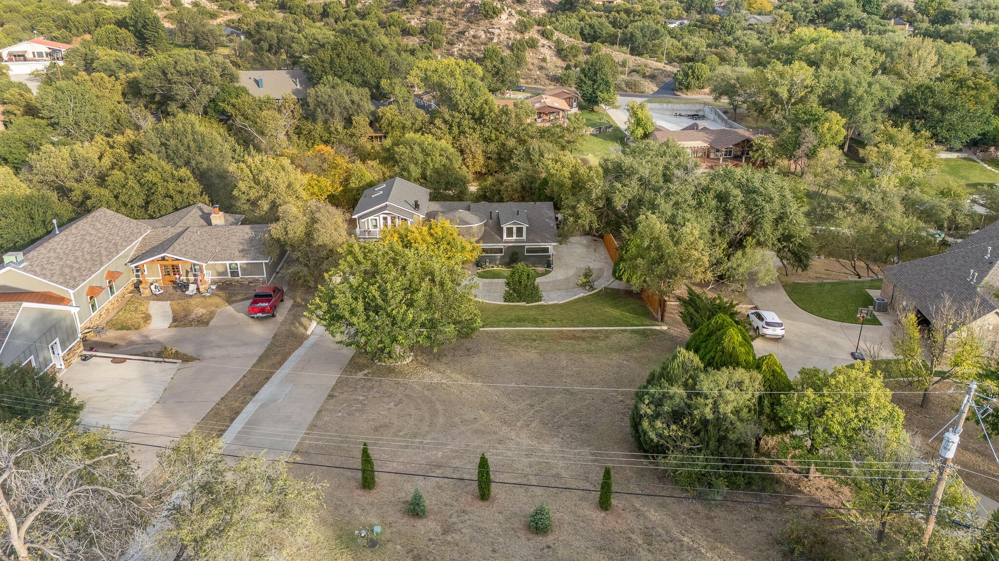 110 Caprock Lane Amarillo, TX 79118 - Photo 41 of 46 an aerial view of a house with a yard