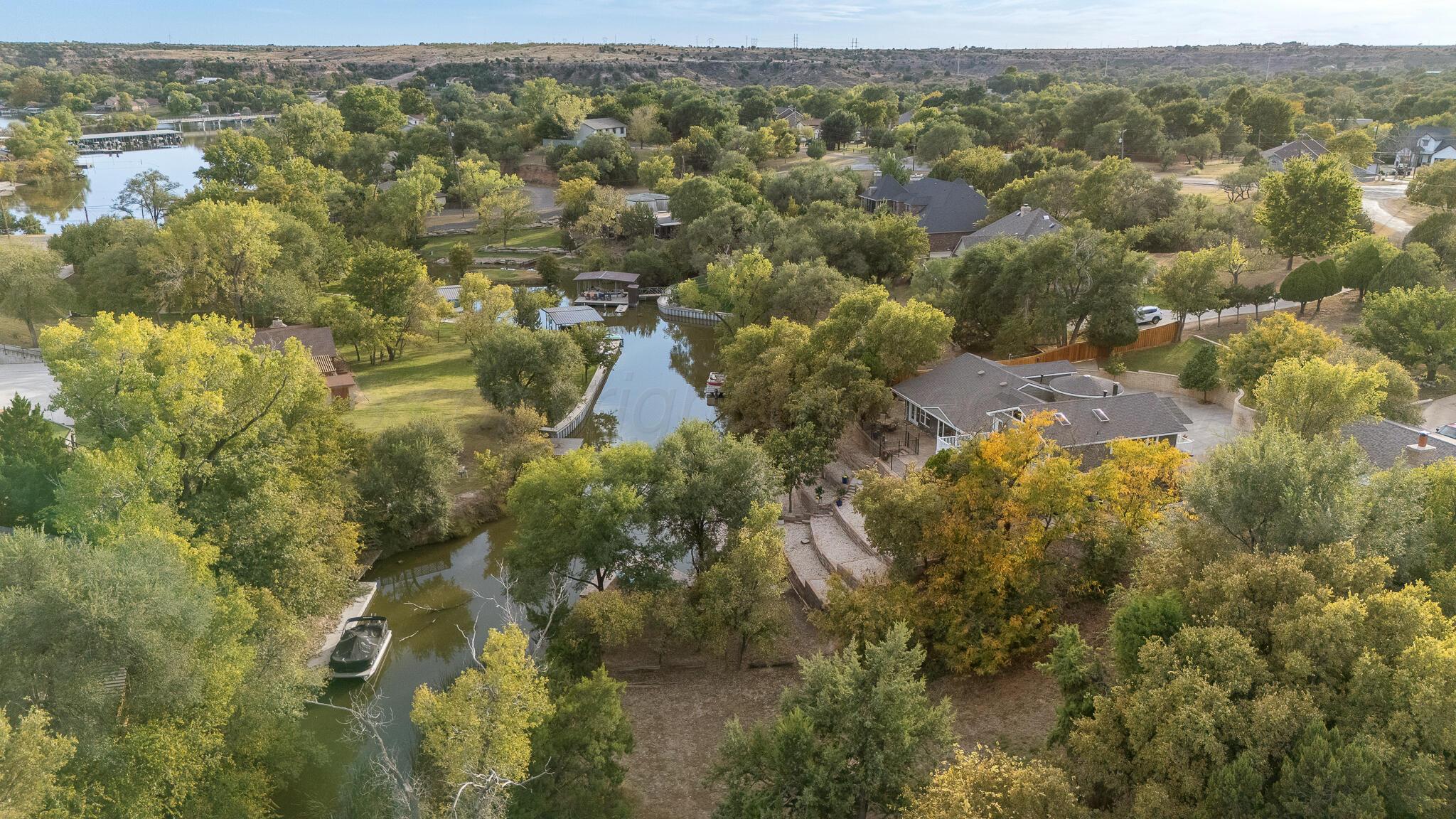 110 Caprock Lane Amarillo, TX 79118 - Photo 43 of 46 an aerial view of residential houses with outdoor space and trees