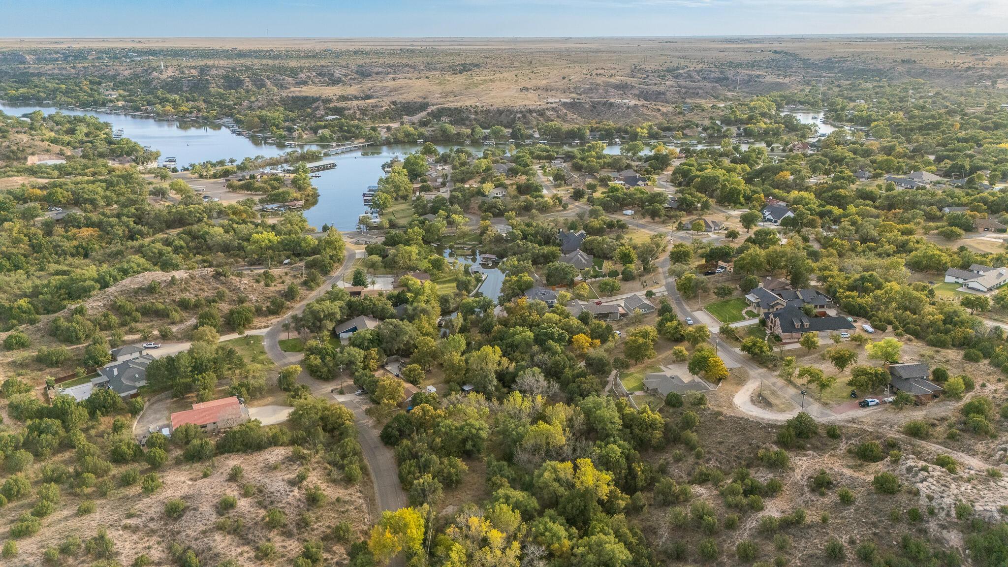 110 Caprock Lane Amarillo, TX 79118 - Photo 46 of 46 a view of a city with lush green forest
